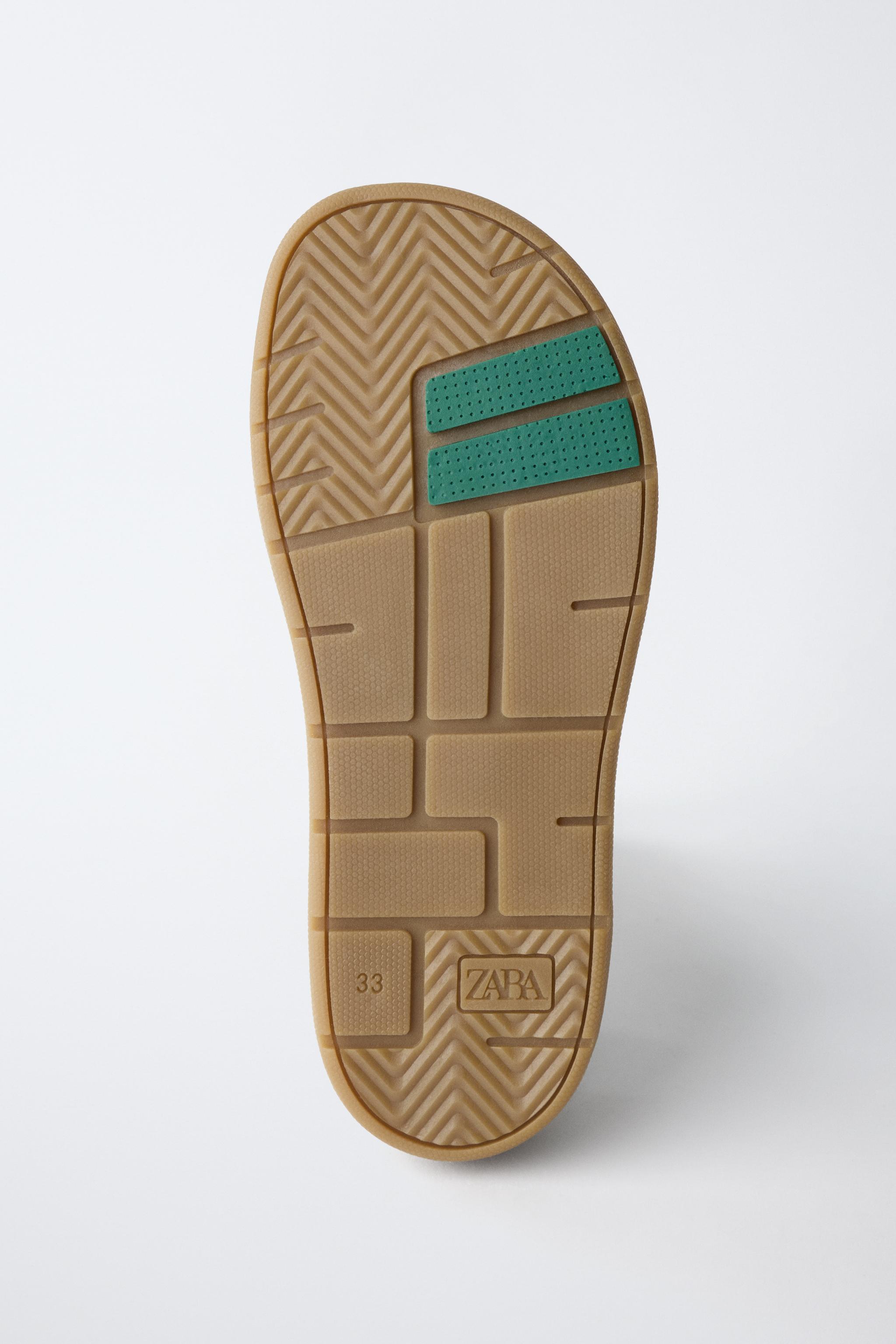 TENNIS EN CUIR PIEDS NUS